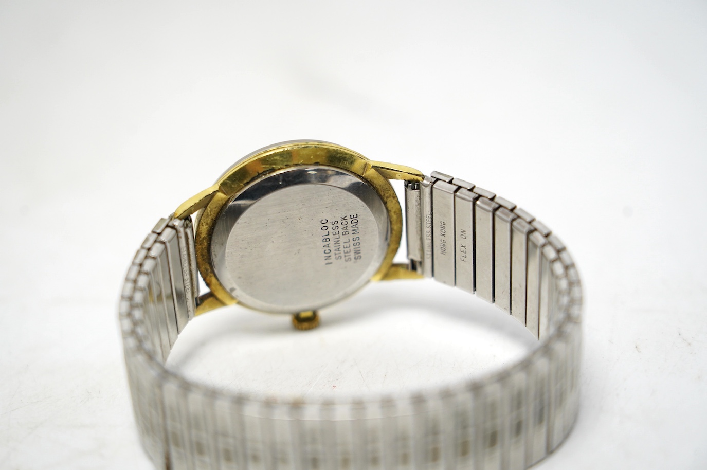 A gentleman’s gold plated Limit wrist watch with three minor watches. Condition - poor